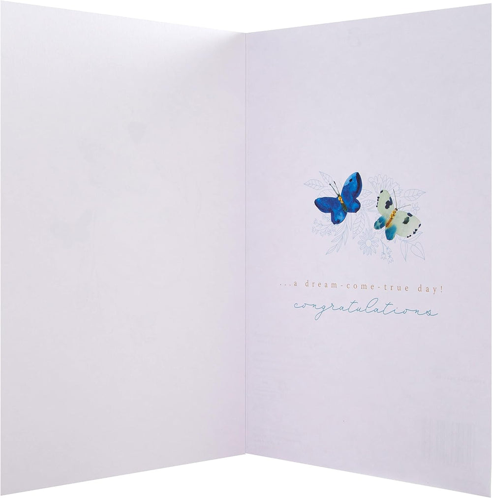 Hallmark wedding card featuring a traditional gold rings design, perfect for celebrating a couple's special day.