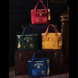 Harry Potter Slytherin alumni cooler bag featuring Hogwarts crest and green Slytherin emblem, perfect for lunch or snacks.
