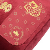 Harry Potter Gryffindor alumni lunch bag with Hogwarts crest and house colors, featuring Harry Potter branding and a zip closure.