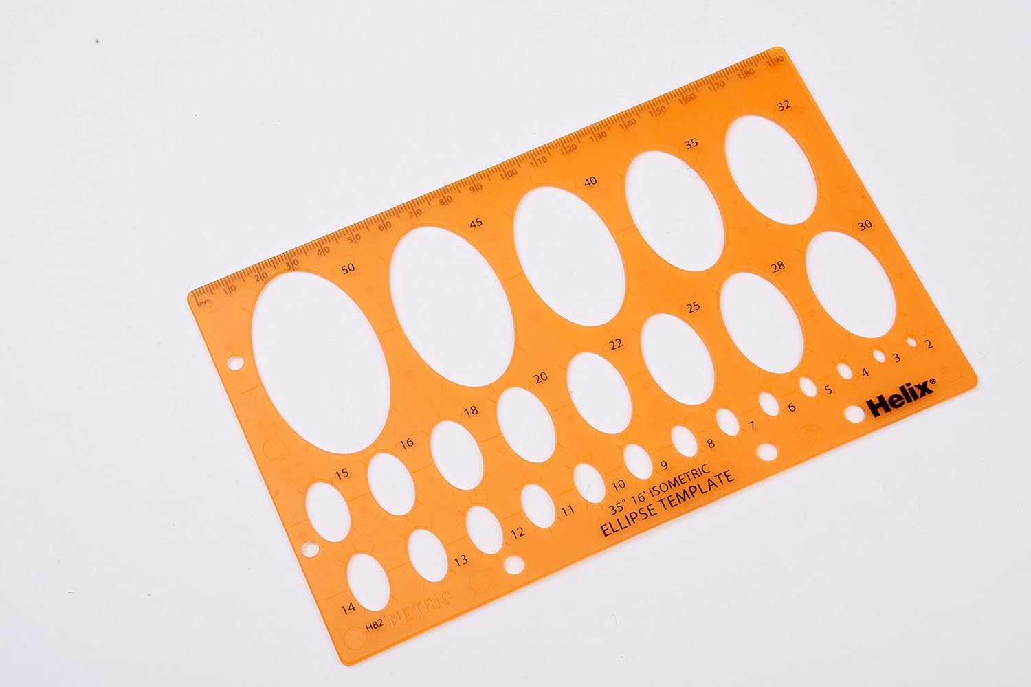 Helix Metric Ellipse Template for math sets, showing a clear plastic template with various ellipse shapes and measurement markings.