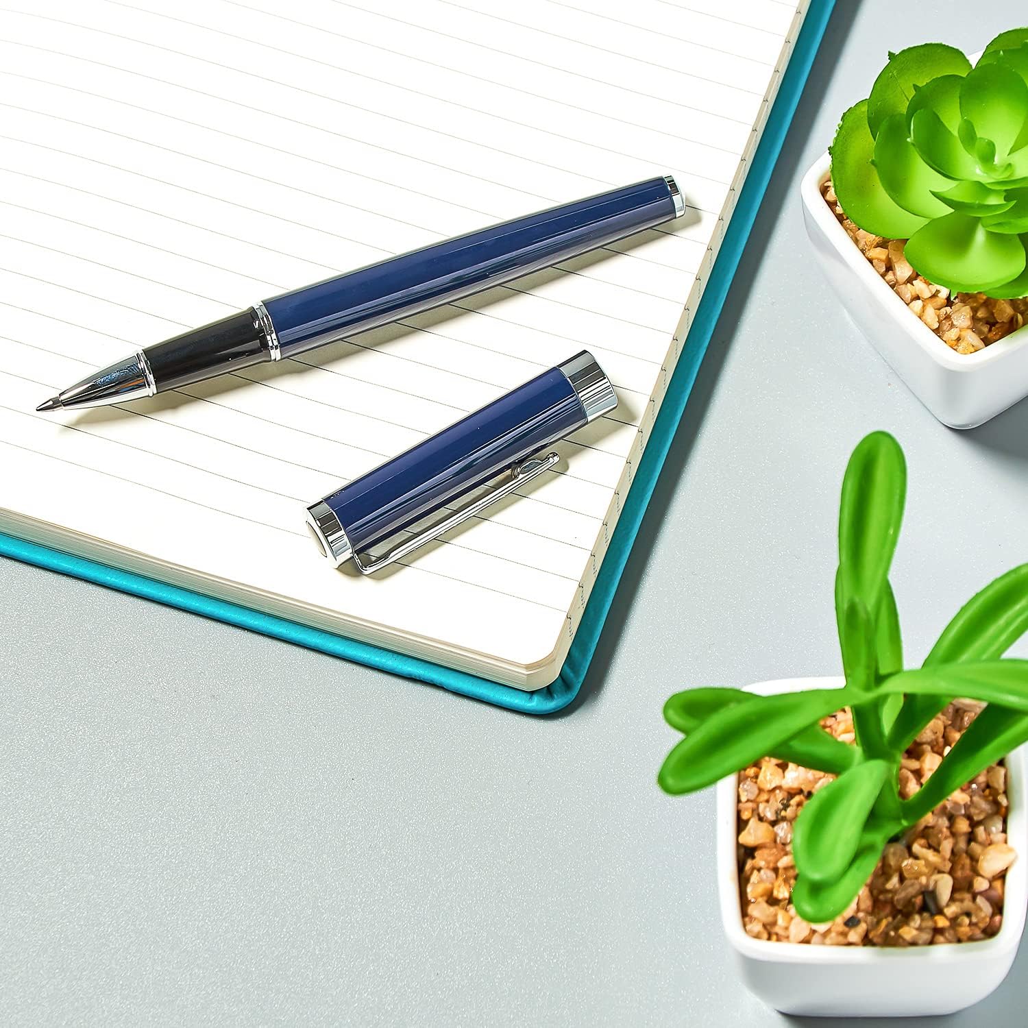 Helix Oxford Premium Rollerball Pen with blue ink, displayed with eco-friendly plastic-free packaging.