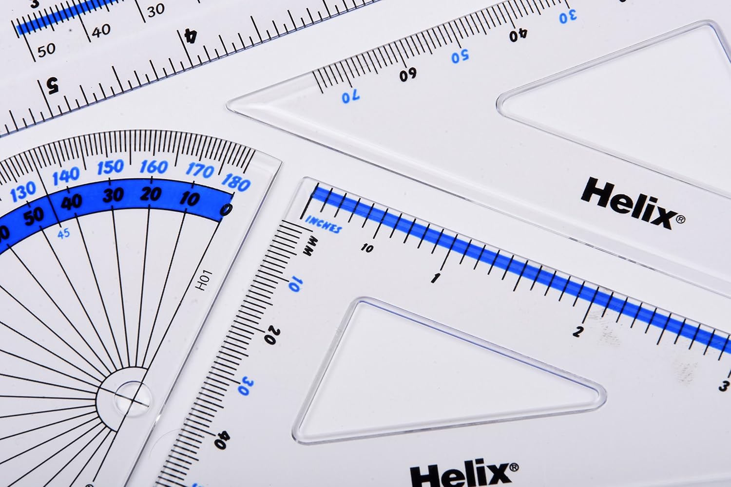 Helix 15 cm 4-piece geometry set with rulers, compasses, and protractor for math and geometry tasks.