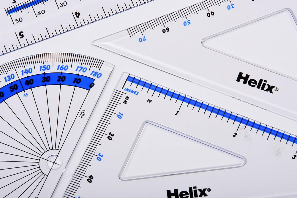Helix 15 cm 4-piece geometry set with rulers, compasses, and protractor for math and geometry tasks.