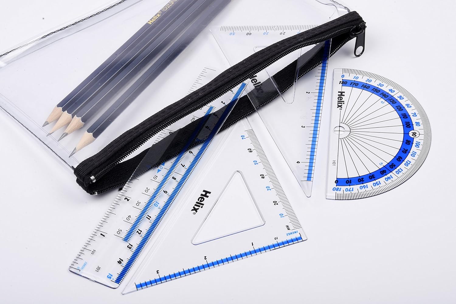 Helix 15 cm 4-piece geometry set with rulers, compasses, and protractor for math and geometry studies.