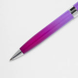 Helix Oxford Premium Ombre Pink ballpoint pen with blue ink, showcasing its stylish pink and blue gradient design.