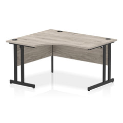 Dynamic Impulse W1400 x D1200/800 x H730mm Left Hand Crescent Desk With Cable Management Ports Cantilever Leg Grey Oak Finish Black Frame - MI003347 DD