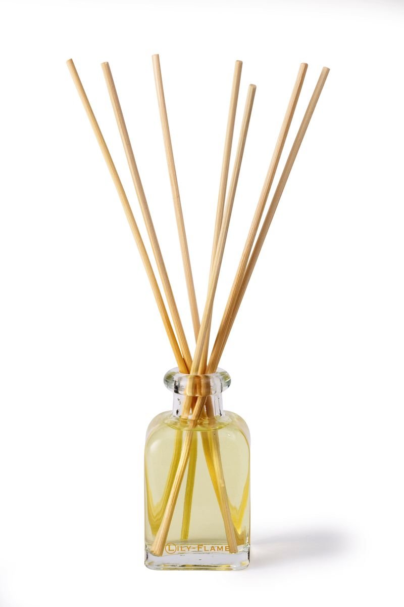 Lily-Flame reed diffuser refills with natural reed sticks, designed for use in home fragrance reed diffusers.