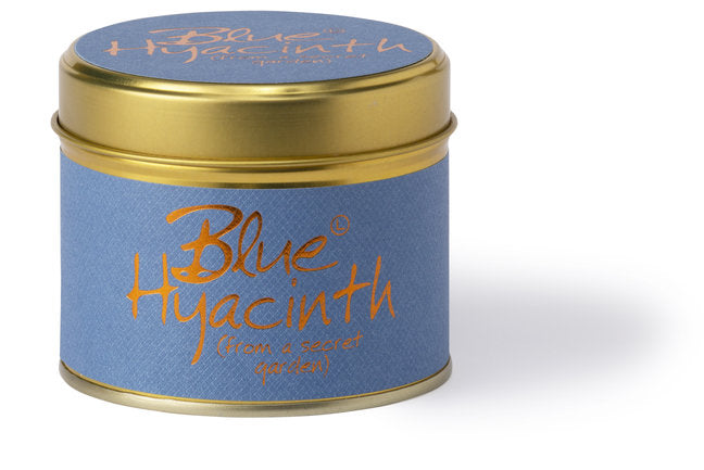 Blue Hyacinth scented tin candle by Lily-Flame, featuring a decorative floral design on a blue candle inside a metal tin.