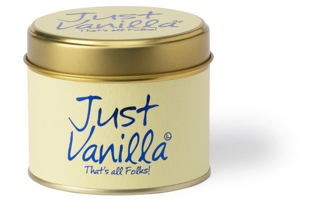 Lily-Flame Just Vanilla scented tin candle with a decorative label and a lit wick, designed for warm, vanilla fragrance.