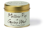 Lily-Flame scented tin candle with Mellow Figs and Garden Mint fragrance, featuring a decorative label and metal tin container.