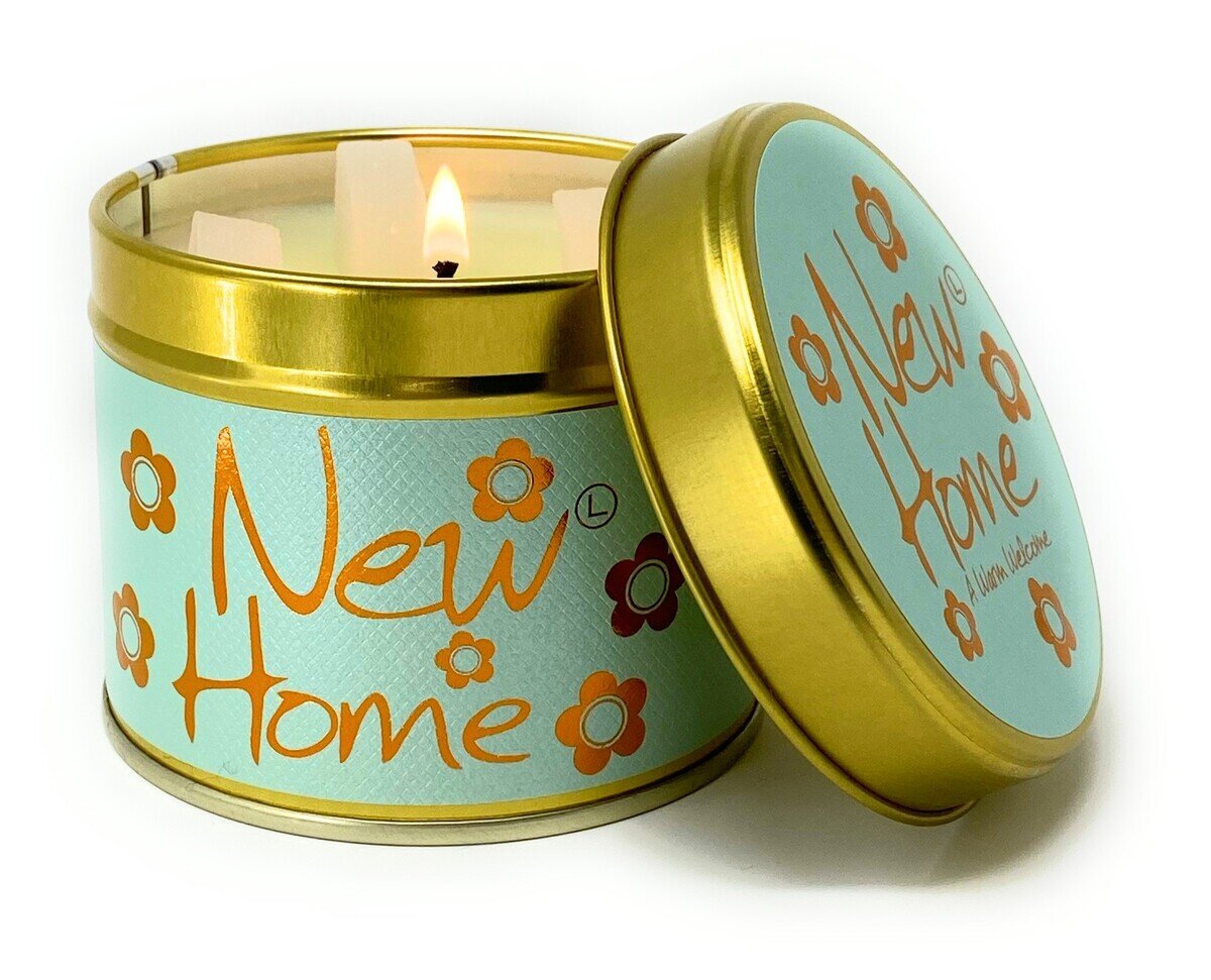 Lily-Flame New Home scented tin candle with a decorative label, perfect for adding warm ambiance to a new house.