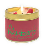 Lily-Flame Rhubarb scented tin candle with a decorative label, perfect for adding a fragrant touch to any space.