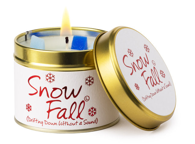 Lily-Flame Snow Fall scented tin candle with festive winter design and cozy fragrance in a small metal container.