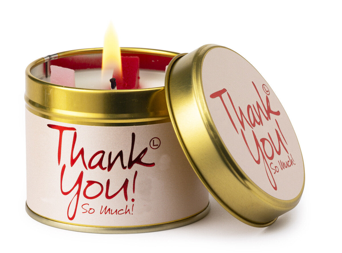 Lily-Flame Thank You scented tin candle with a decorative label, perfect for gifting or adding a cozy aroma to a space.