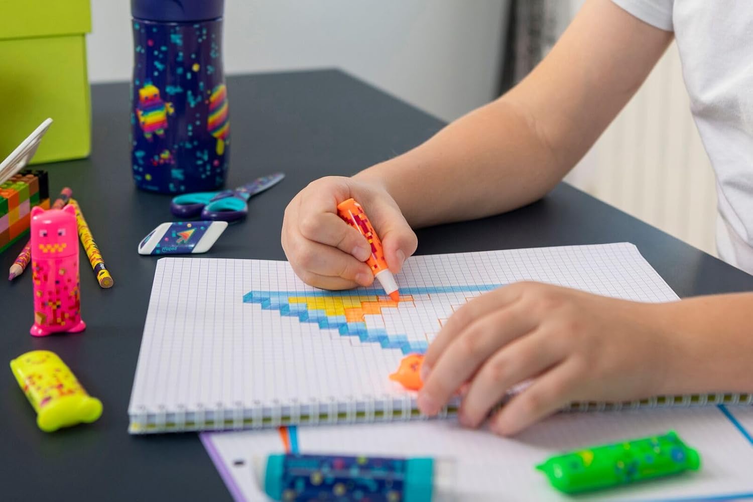Set of four Maped Pixel Party Mini Highlighters in vibrant colors for highlighting notes and texts.