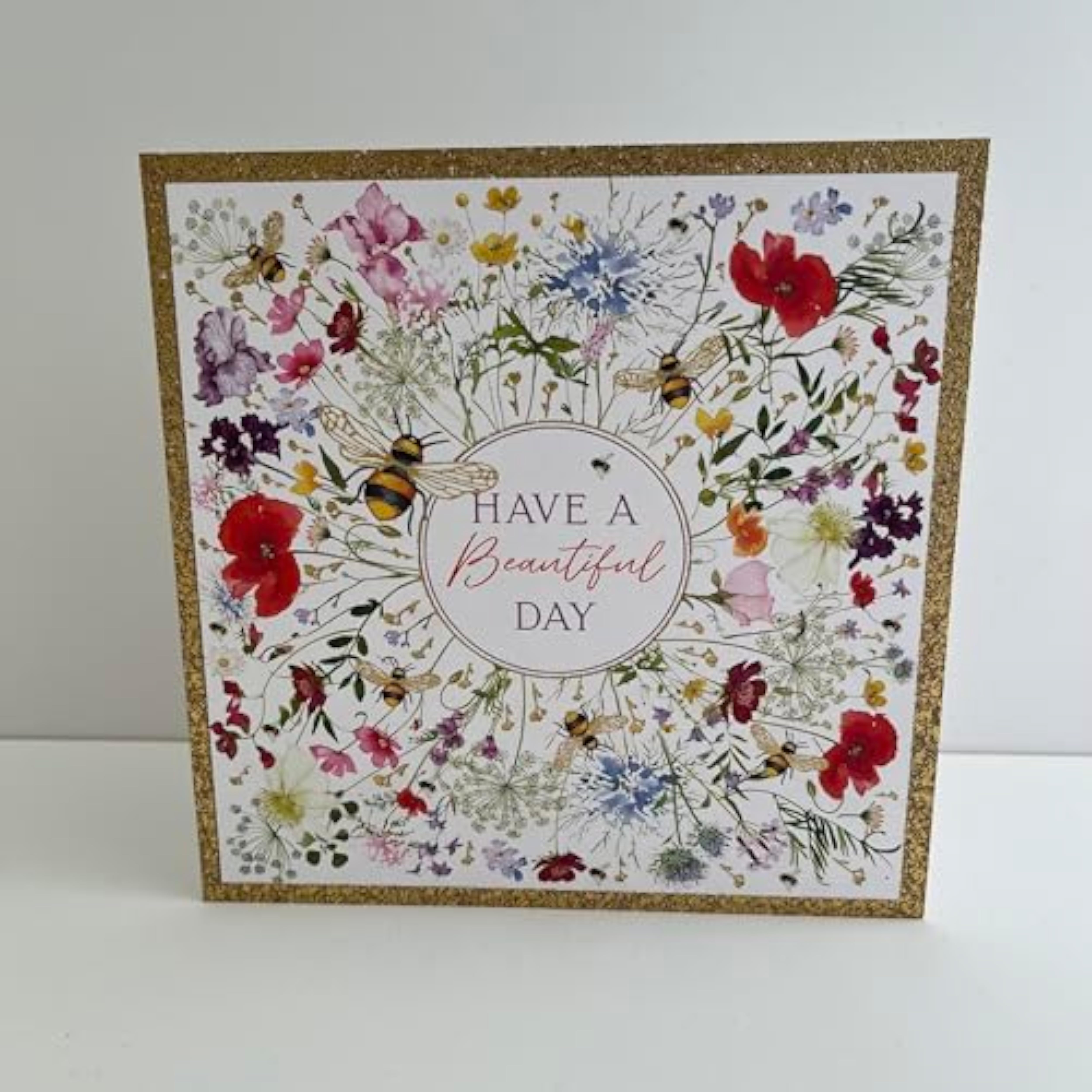 NQ Beautiful Day Wildflower Bloom birthday card with gold foil accents, featuring colorful wildflowers and elegant design.