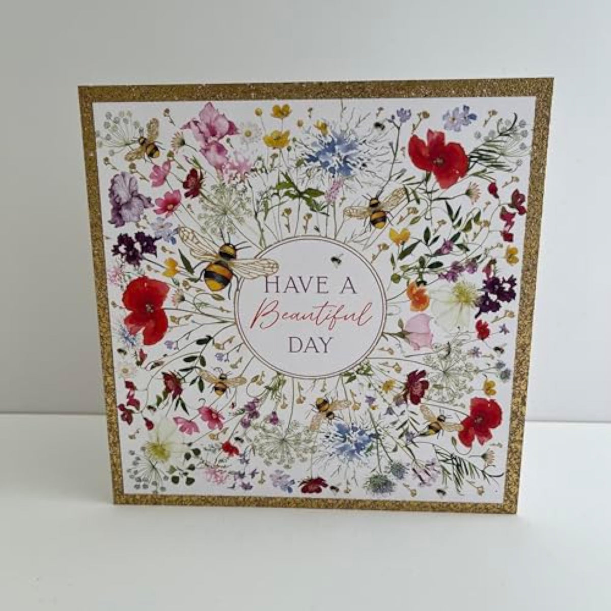 NQ Beautiful Day Wildflower Bloom birthday card with gold foil accents, featuring colorful wildflowers and elegant design.