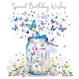 Silver foil birthday card featuring a butterfly jar illustration from NQ, with elegant and colorful design for celebrating birthdays.