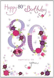 Female 80th birthday card by NQ featuring knitted "80" and floral basket design with flitter finish.