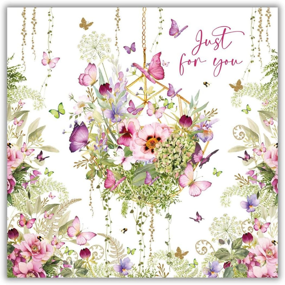 Female birthday card by NQ featuring colorful floral designs and cheerful message, perfect for celebrating birthdays.