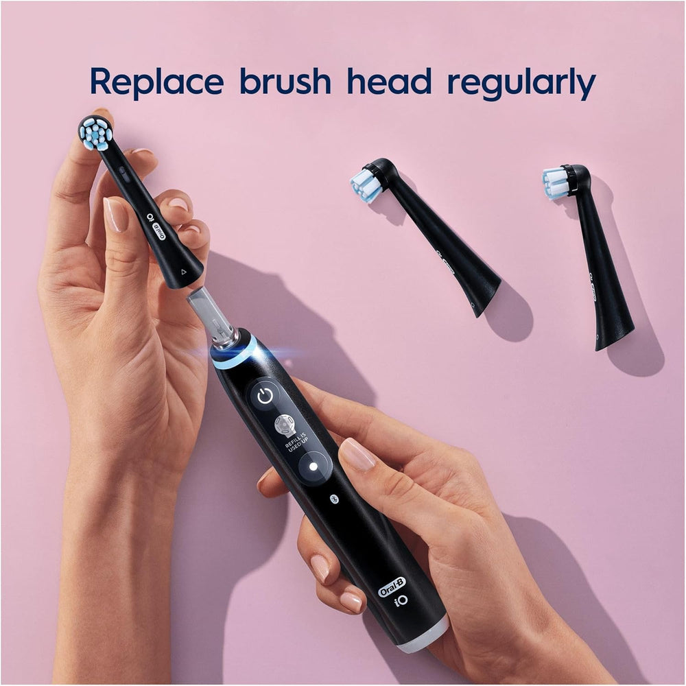 Six black Oral-B iO Gentle Care replacement brush heads for electric toothbrushes, shown in a 6-pack.
