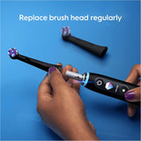 Six black Oral-B iO Radiant White replacement brush heads for electric toothbrushes, designed for effective cleaning and whitening.