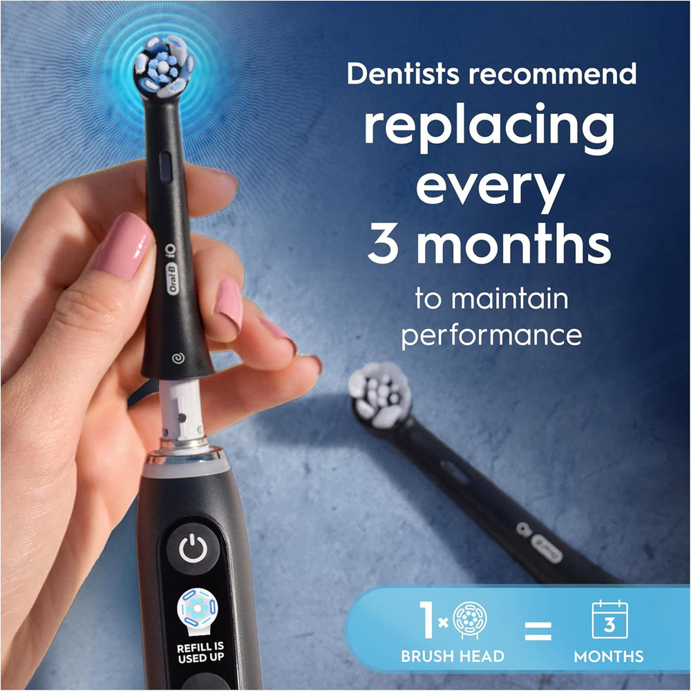 Oral-B iO Ultimate Clean replacement brush heads in black, pack of four, designed for electric toothbrushes.