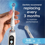 Set of four Oral-B iO Ultimate Clean replacement toothbrush heads in white for optimal oral hygiene.