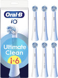 Six white Oral-B iO Ultimate Clean replacement brush heads for electric toothbrushes, shown in a clear image.