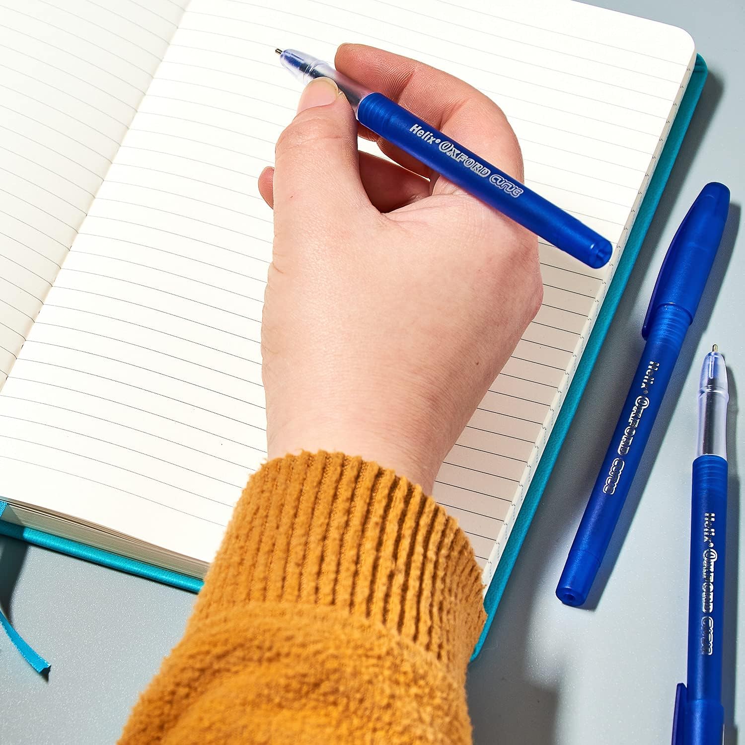 Set of 10 Oxford Writing Curve Blue Pens with sleek design and smooth ink flow, perfect for everyday writing tasks.