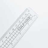 Oxford Buddy Essential Stationery Set with compact clear pencil case, perfect for fitting in a school blazer pocket.