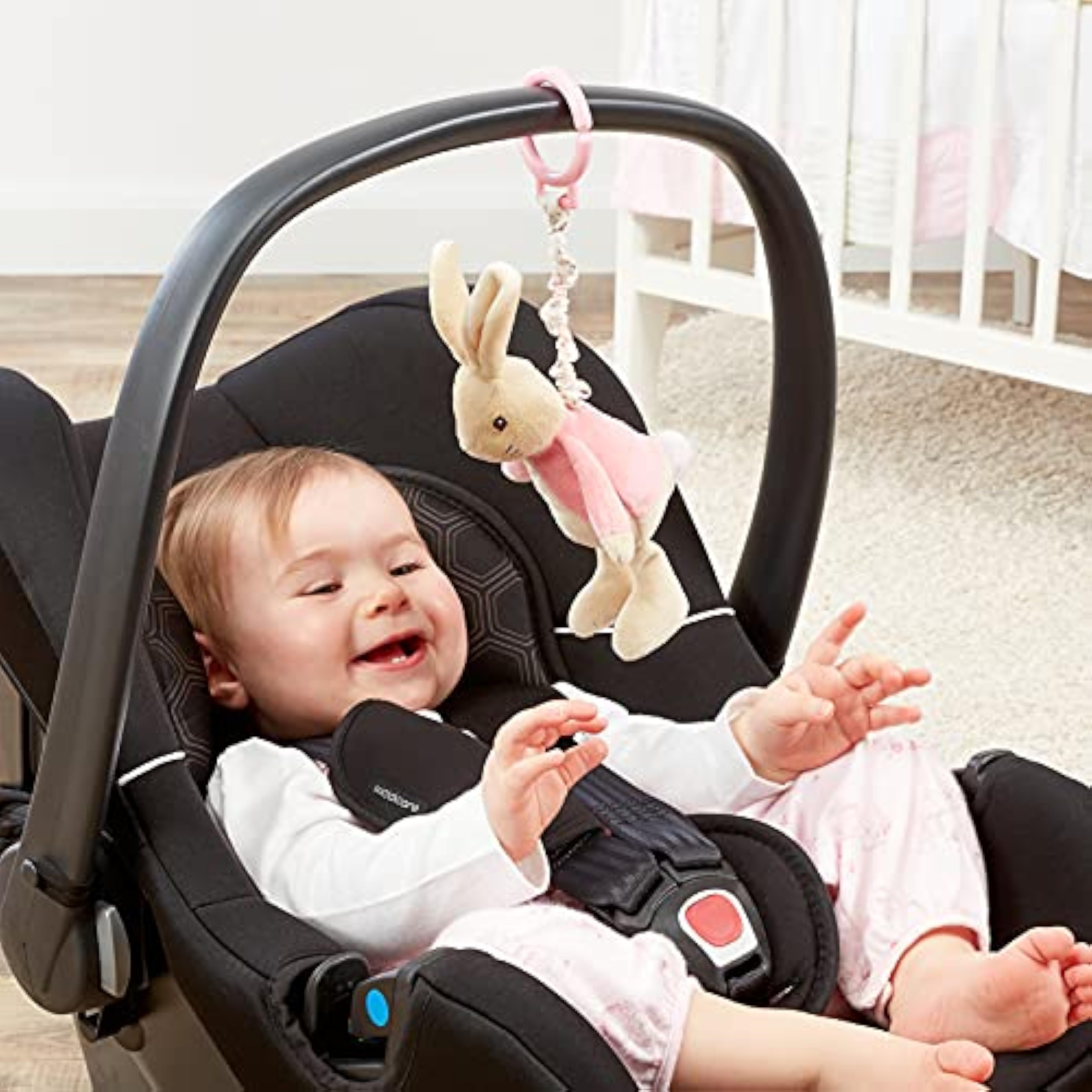Pink Beatrix Potter Flopsy jiggle attachable pram toy by Rainbow Designs featuring Peter Rabbit for infants.