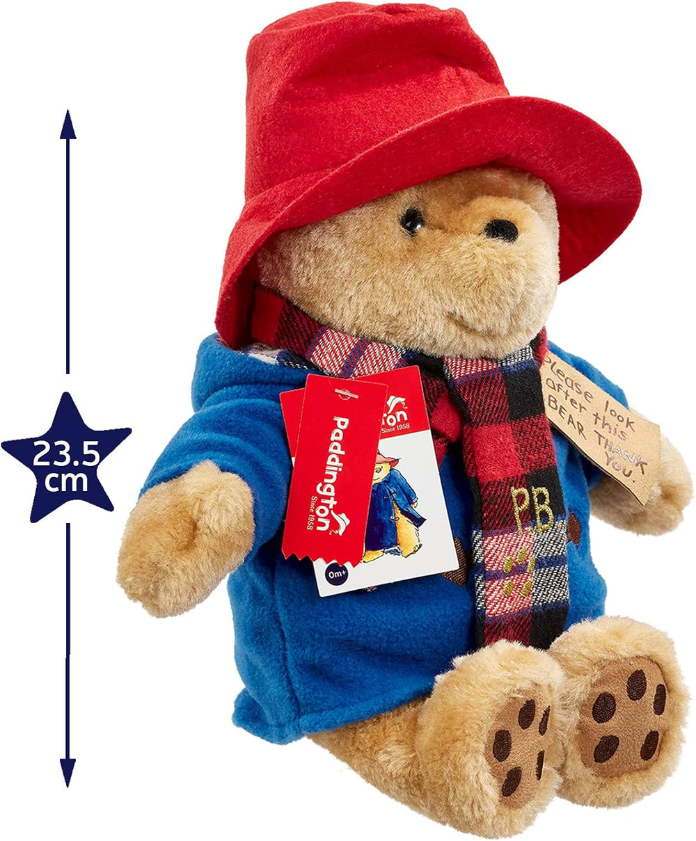Soft plush Paddington bear toy by Rainbow Designs wearing a colorful scarf, perfect for cuddling and display.