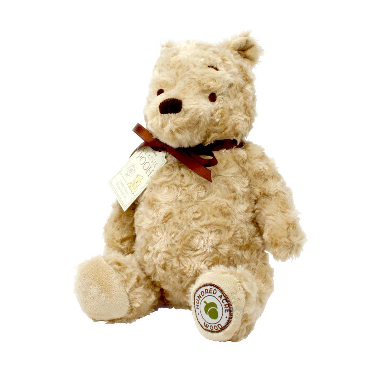 Soft Winnie the Pooh plush toy from Rainbow Designs, Hundred Acre Wood Cuddly Winnie the Pooh soft toy, featuring a plush, cuddly appearance.