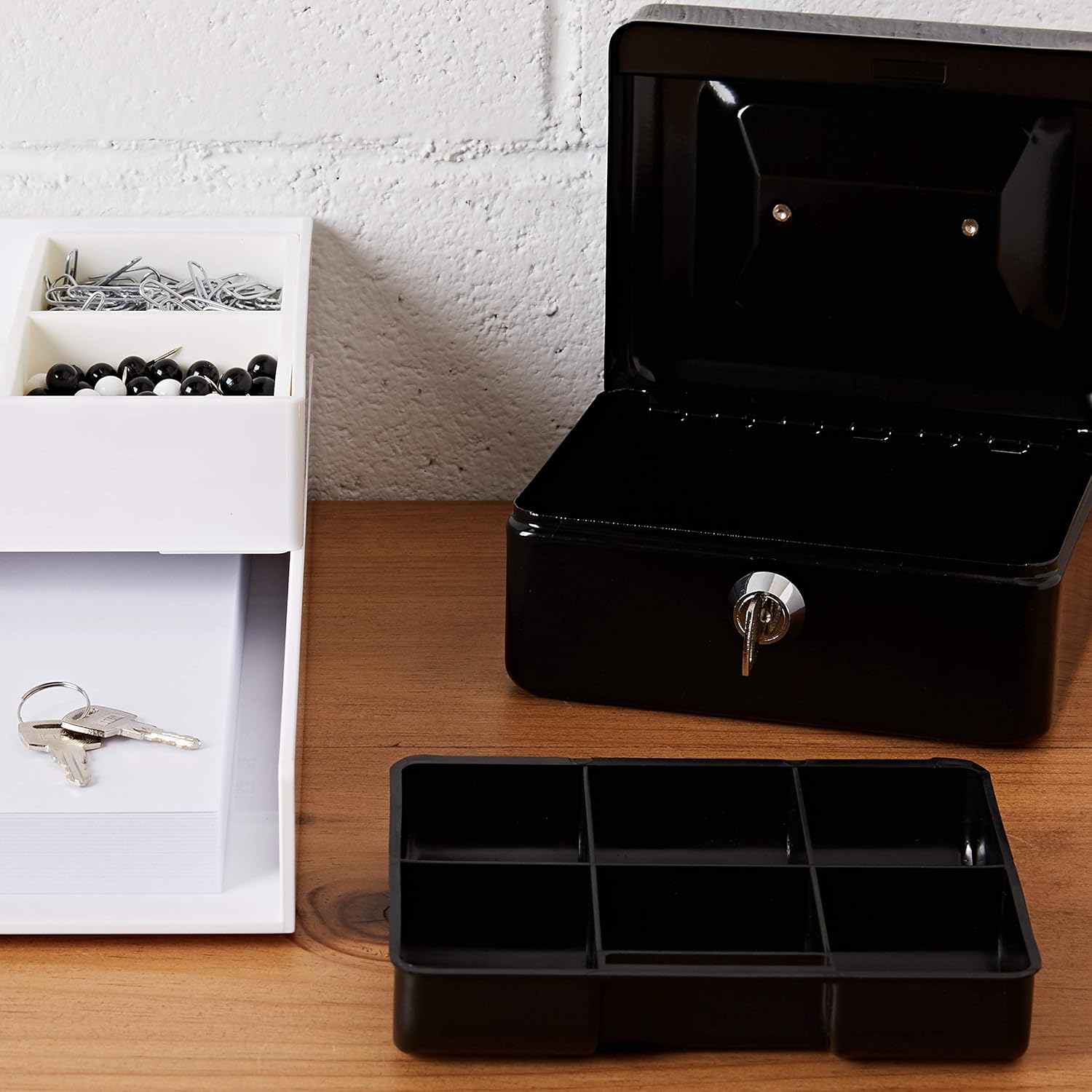 Black Rapesco cash box, 6-inch/15cm size, with secure latch and sturdy metal construction for cash storage.