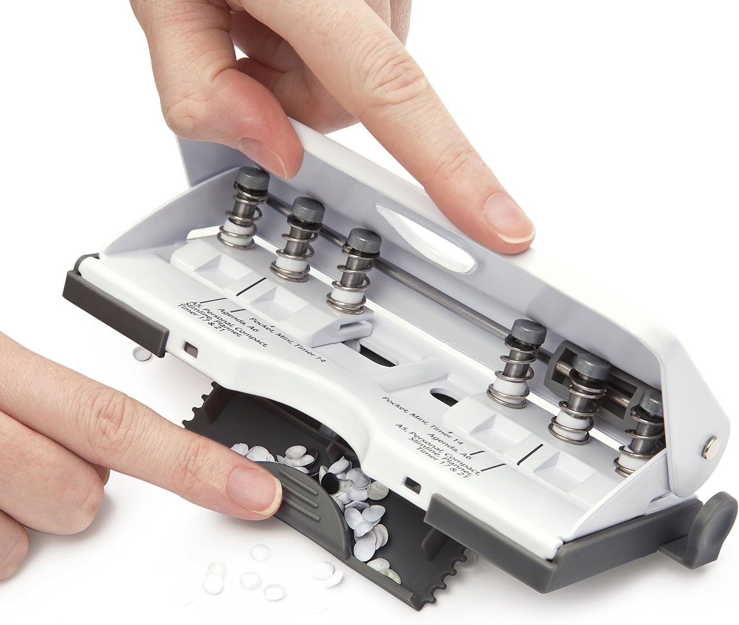 Rapesco 1321 white adjustable 6-hole diary puncher with silver handle, capable of punching up to 10 sheets of paper.