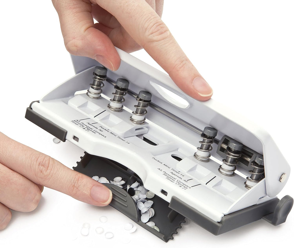 Rapesco 1321 white adjustable 6-hole diary puncher with silver handle, capable of punching up to 10 sheets of paper.