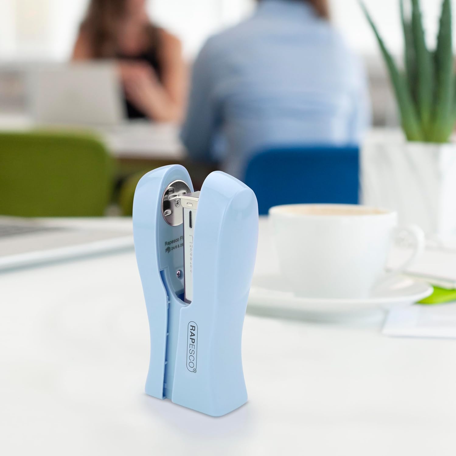 Rapesco Stand Up Space-Saving Stapler in powder blue, holds up to 20 sheets, compact design for easy stapling.