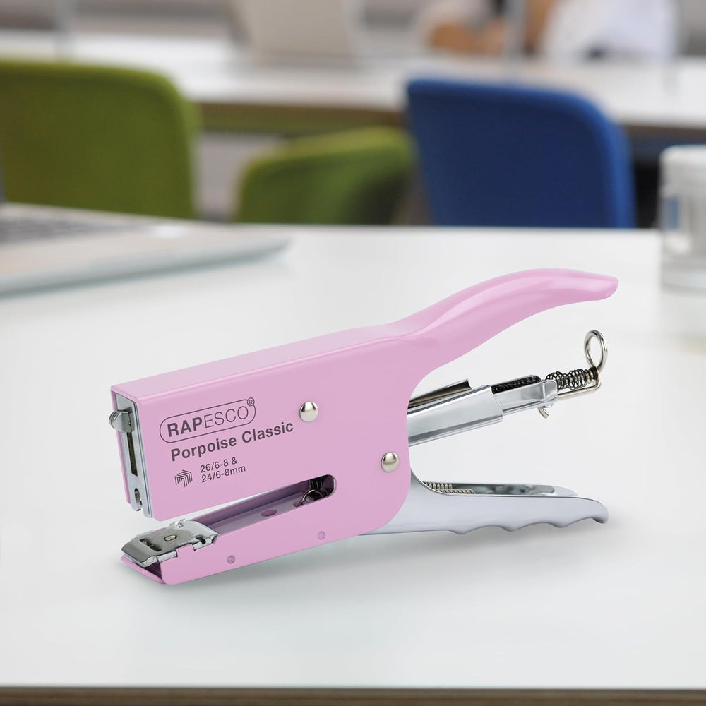 Rapesco Porpoise Classic Stapling Pliers in chrome and candy pink, designed for 24/6 and 26/6 staples, with ergonomic handles.