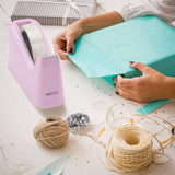 Rapesco heavy duty tape dispenser in candy pink with two rolls of adhesive tape on a plain background.