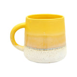 Yellow ceramic mug from Sass & Belle Mojave Glaze collection, perfect for coffee or tea in home and kitchen settings.