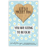 Second Nature keepsake gift with a small pocket hug wish token featuring motivational message on a light background.