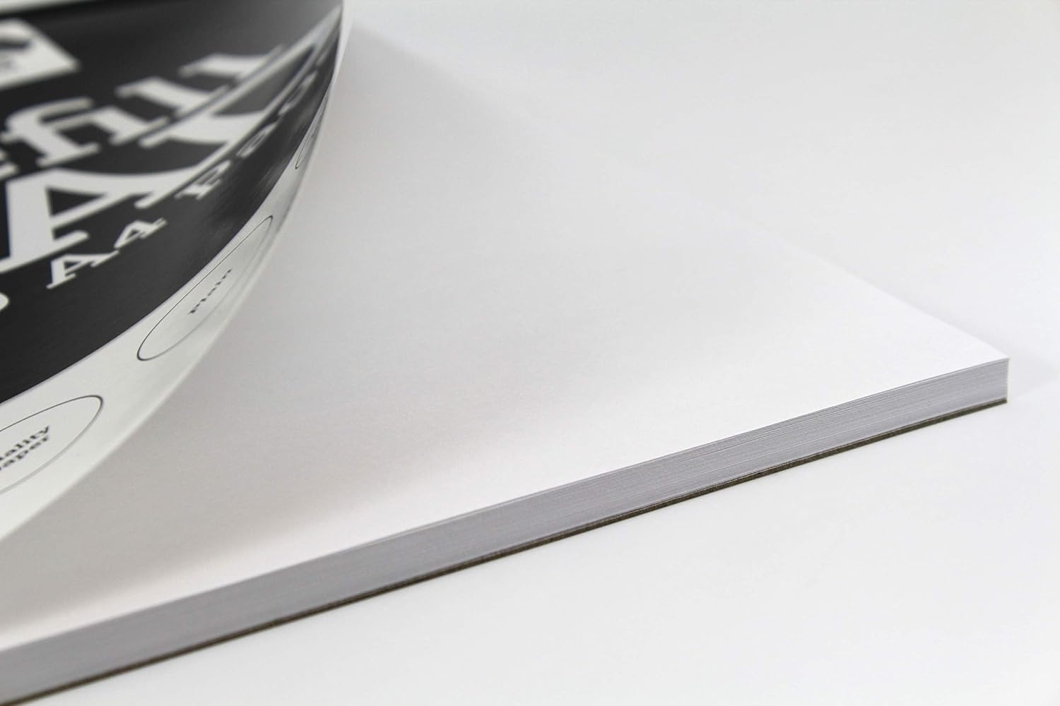 Silvine 160-page A4 refill pad with head binding, 4-hole punched plain white pages for notebooks or refills.