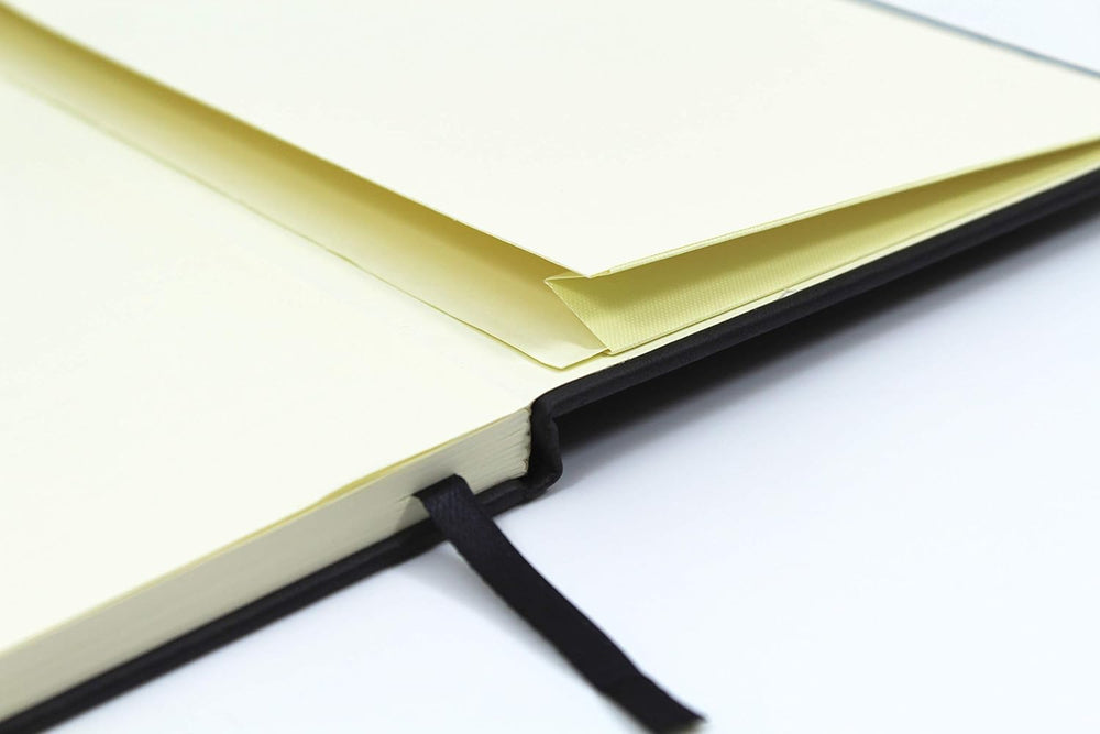 A black Silvine A5 casebound notebook with a textured cover, open to blank lined pages, ideal for writing and note-taking.