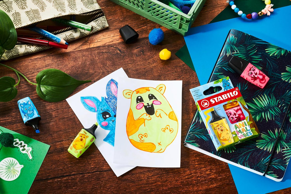 Set of three Stabilo BOSS Mini Animal Vibes highlighter pens in assorted colors, featuring cute animal-themed designs.