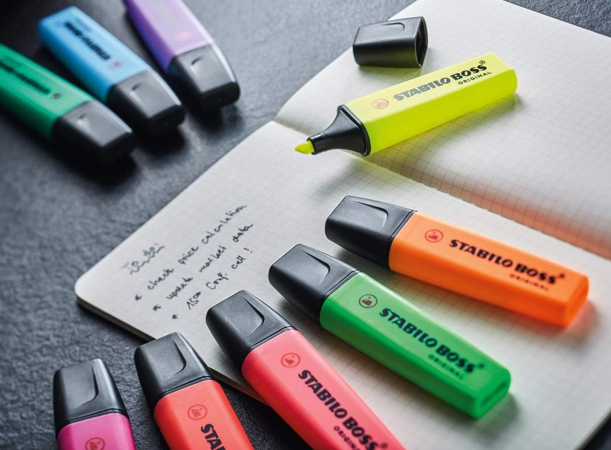 Set of four red Stabilo Boss Original highlighters with chisel tips, ideal for highlighting and color coding.