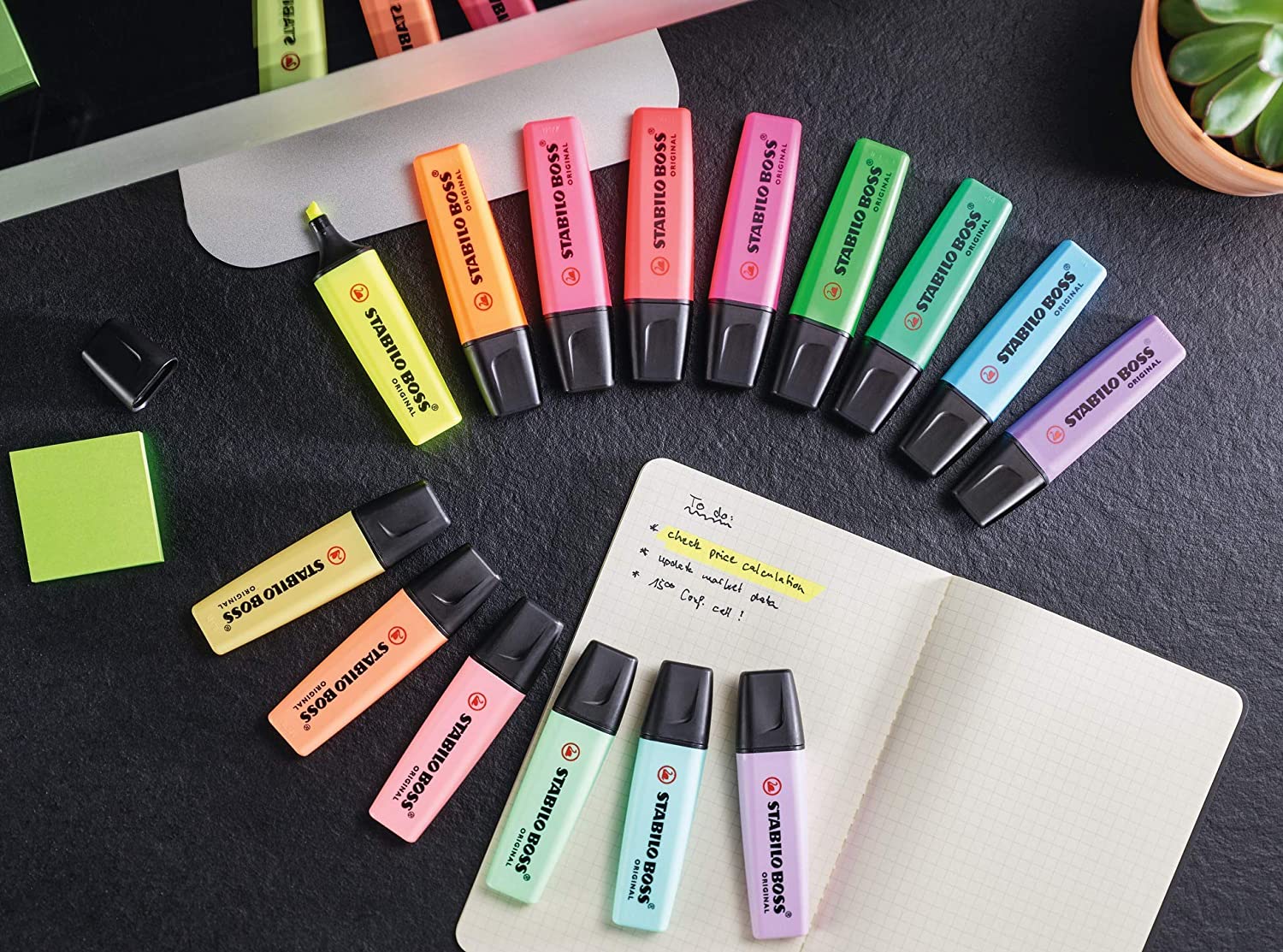 Set of 8 Stabilo Boss Original highlighters in assorted colors, displayed in a clear plastic case with vibrant caps.