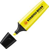 Set of four Stabilo Boss Original yellow highlighters with chisel tips, ideal for highlighting and marking text.