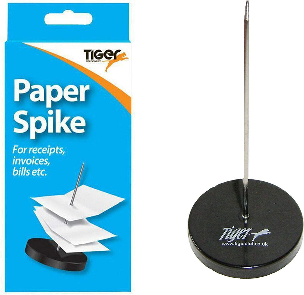 Metal paper spike from Tiger, a sturdy paper clip holder with a sleek silver finish, perfect for organizing papers on a desk.