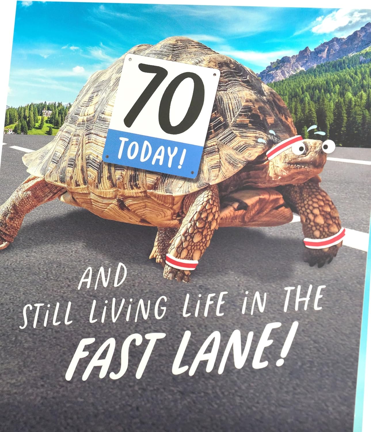 UK Greetings 70th Birthday Card featuring a humorous tortoise design, with an envelope, suitable for her or him.